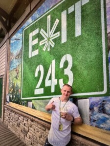 Dispensary Exit 243 sign